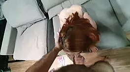 Teen hottie with red hair poses for angry closeup while taking a dick in her mouth and deep throating it