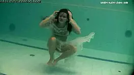 Russian Babe Natalia Swims And Strips