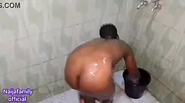 African Teen Takes Homemade Bath
