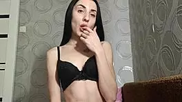 40-kilo girl spreads legs and plays with her cunt