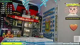 German redhead with huge tits and perfect ass naked at Oktoberfest. Oiled body shines!