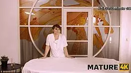 mature4k cougar seduces young client during steamy massage session