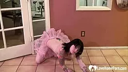 Adorable tattooed slut in pink skirt masturbates