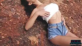 Gloria Sol performs an outdoor striptease in the mountains.