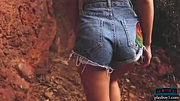 Gloria Sol performs an outdoor striptease in the mountains.