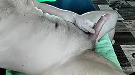 handjob on a wet cock leading to a big cumshot