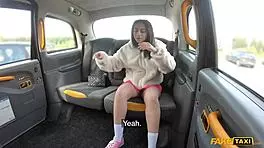 Petite 18+ London teen teases driver in fake taxi before taking on his huge cock.