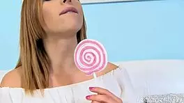 Russian blonde beauty inserts sweet candy for masturbation