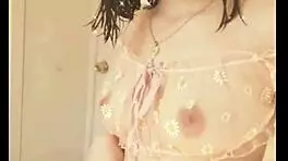 Kawaii woman shows her natural tits in the bedroom