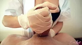Sexy Nurse Eva Myst Gives Professional Handjob with Gloves and Oil