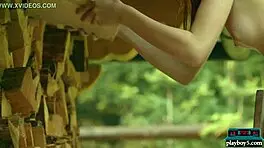 Tiny teen playboy model strips naked outdoor chopping wood!