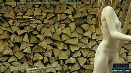 Tiny teen playboy model strips naked outdoor chopping wood!