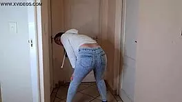 Desperate teen pisses in jeans and jacket