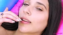 Glamorous brunette poses naked in close-up