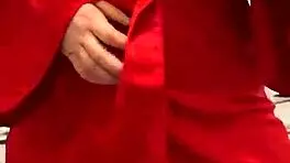 brunette in red lingerie plays with herself