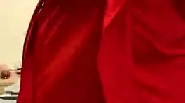 brunette in red lingerie plays with herself