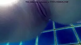 Blonde pool babe Wendy swims nude underwater!