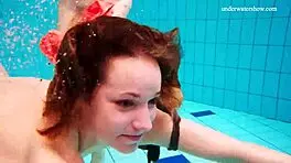 Avenna, Nina Mohnatka, and Marketa dive into steamy pool fun with bikini babes