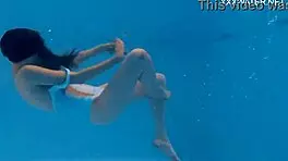 marfa, the unique and beautiful pornstar, shines by the pool with her tight body