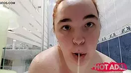 Chubby teen girl showering and fingering her fat pussy
