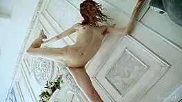 Check this sexy ballerina stripping on the couch