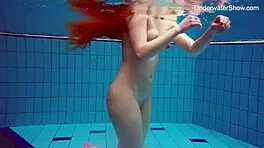Simonna Hot and Horny Smoking in Public Swimming Pool with Juicy Big Ass Tits