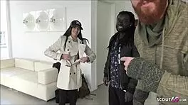 Young German college student in leggings sucks two huge cocks.