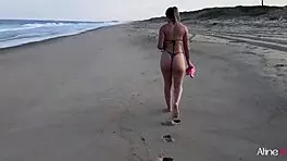 Blonde Girl On The Beach Interacts With Her Fan In An Unexpected Way