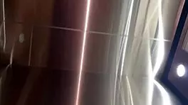 Watch her give a blowjob in the elevator!