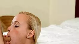 Arousing Blonde Plays With Shaved Pussy