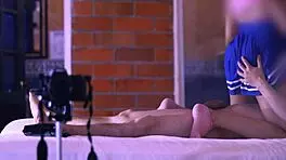 Teen student and stepmother exchange soft caresses on the sofa