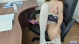 Cheeky nymphomaniac intensely fucks her pussy on the principal's desk