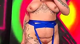 This curvy punk teen casually flaunts her big tits and sexy body