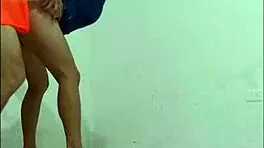 Hospital cleaner seduces nurse, puts on condom, and fucks her like a slut standing in office hallways.