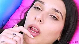 Enchanting brunette teen 18+ reveals sexy body during solo sofa photoshoot.