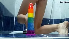 Cuntboy Xannie enjoys anal play in the shower with toys