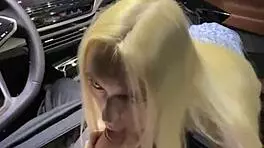 Busty blonde fucked in car, cum on face