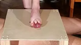Watch domina stomp cock with bare feet! Footjob madness!