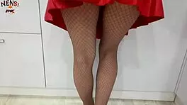 housewife masturbates through torn pantyhose and play with cream