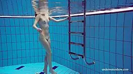 Martina's Tight Pussy Teases In Blue Bikini Underwater