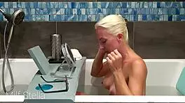 Stella indulges in a soothing bath with intimate shaving rituals