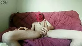 Young amateur masturbates big cock in POV, cums on sofa