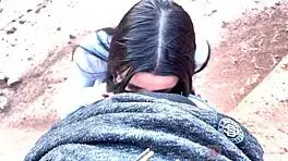 she shows her face with glasses, giving a deep blowjob in a beautiful canyon