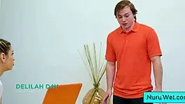 Sexy Teen 18+ Masseuse Delilah Day Covers Naked Body in Nuru Gel, Rubs Against Client Anthony Pierce for Intense Session. Her Pierced Blonde Charm Adds Extra Heat.