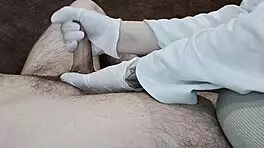 Hungarian Nurse in Gloves Aids Sperm Donation