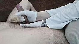 Hungarian Nurse in Gloves Aids Sperm Donation