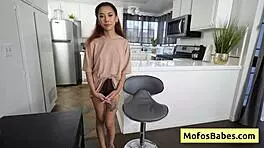 Petite 18+ Asian slut Kalani Luana shows round boobs and sexy tattoos.