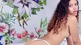 Young girl rubs pussy on pillow