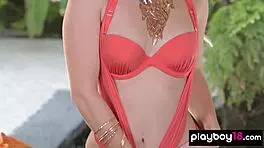 All-natural blonde Australian Alana Wolfe strips to reveal her flawless shaved pussy.