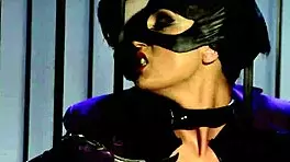 katwoman jennifer dark prowls into a prison cage for a 3way with ball licking and blowjob